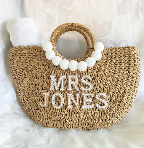 Woven Basket Bag with white Pom Poms