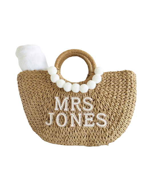 Woven Basket Bag with white Pom Poms