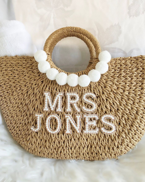 Woven Basket Bag with white Pom Poms